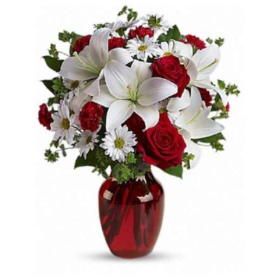<div class="m-pdp-tabs-description">
<div id="mark-1" class="m-pdp-tabs-marketing-description">
<hr />
The spirit of love and romance is beautifully captured in this enchanting bouquet. It's the perfect gift for anyone you love.
</div>
</div>
Red roses and carnations are exquisitely arranged with white asiatic lilies and chrysanthemums in a ruby red glass vase. It's lovely.